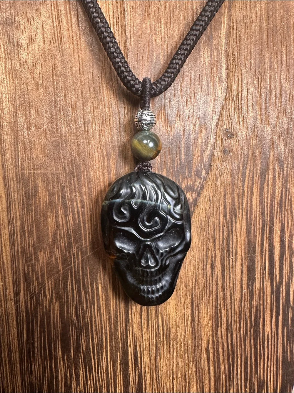 Unique Blue and Golden Tiger’s Eye Skull Carving Pendant Necklace on Brown